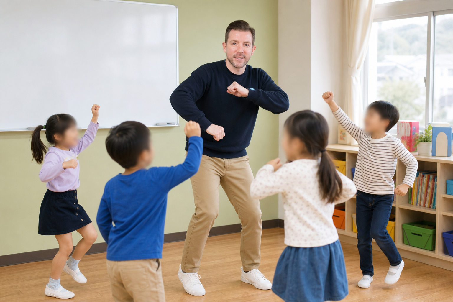 子どもたちとダンスをするトニー。子どもたちの顔は匿名化されています。